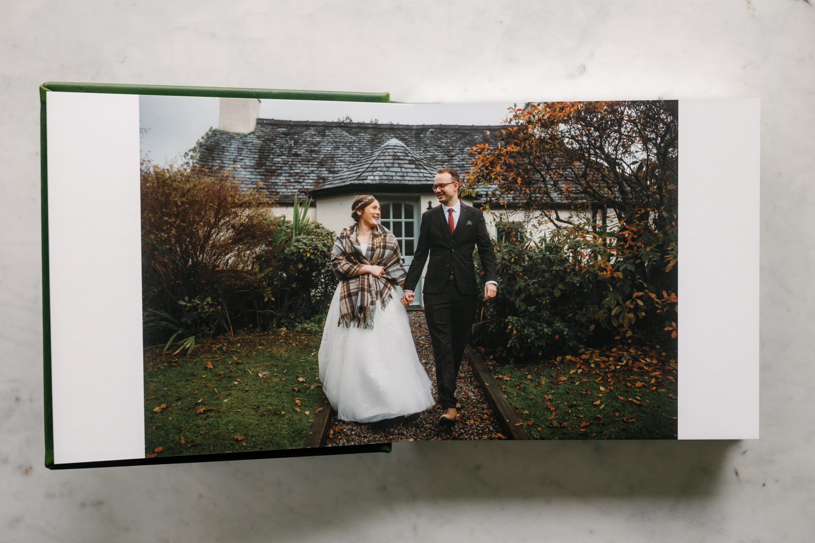 10x10 album in Absinthe premium leather with silver debossing with